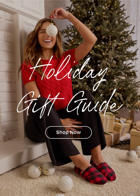 Holiday Gift Guide. 2025 Collection. Shop Now. Model wearing Alpargata Classic in buffalo plaid red faux shearling shown.